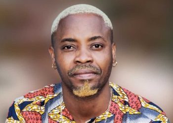 ARISTO LE BLEDARD OU LA MAIN LÉPREUSE QUI BRANDIT LE TOGO AVEC AMOUR